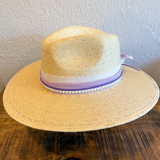 The Carter palm leaf hat with custom purple and white hat bands. 